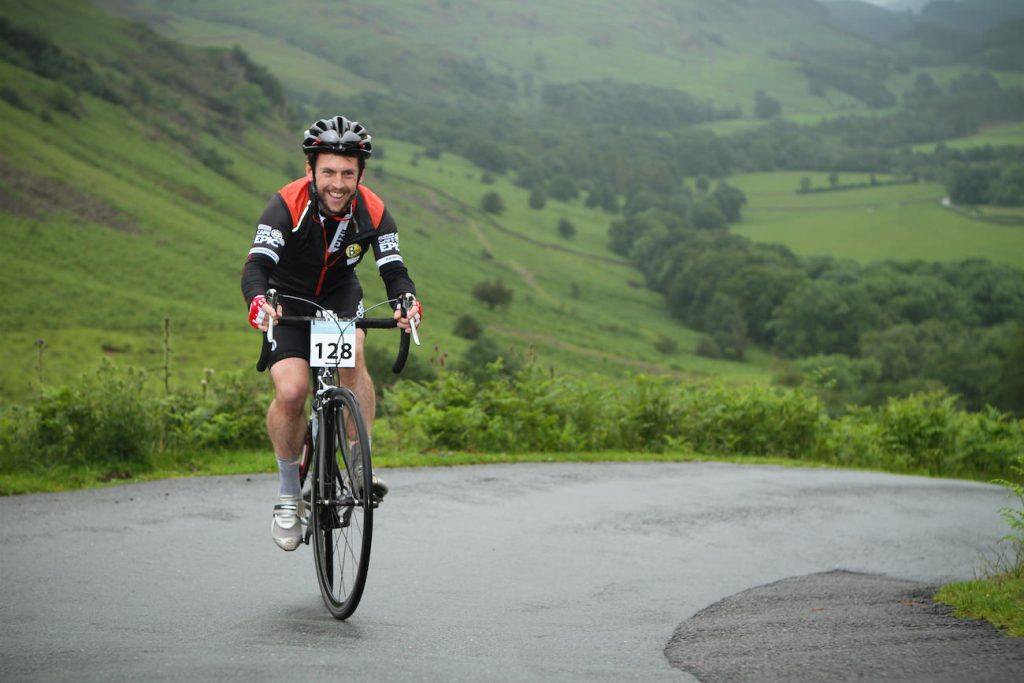 Tobias Mews cycling up Hardknott Pass